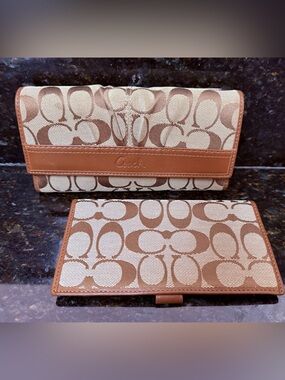 2 piece Coach Brown and Cream Signature Fold-Over Continental Wallet Set.